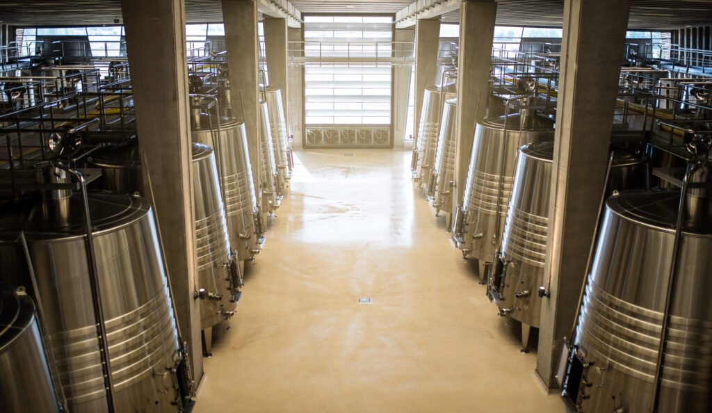 modern winery with big steel barrels